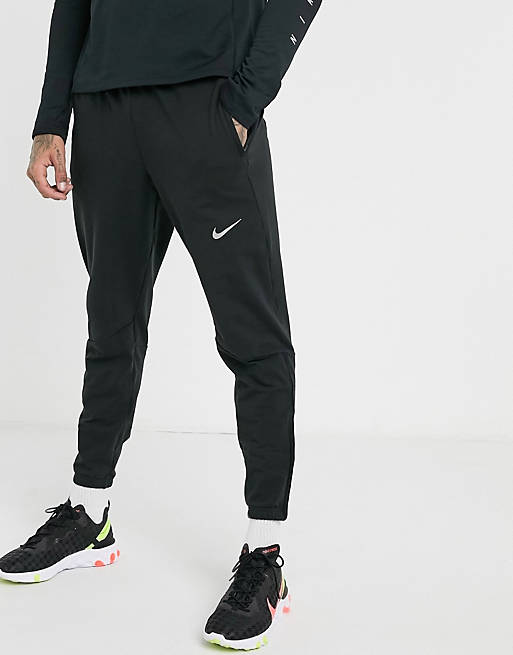 Nike Running Therma Phantom sweatpants in black | ASOS