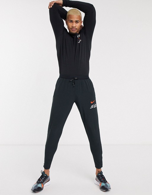 Nike Running Tokyo joggers in black