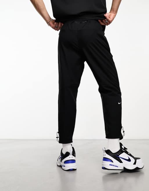 Nike Running Track Club Dri-Fit joggers in black ASOS - Main Image