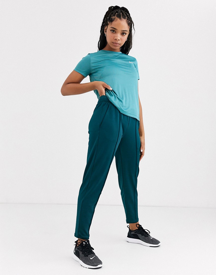 Nike Running track pants in teal blue