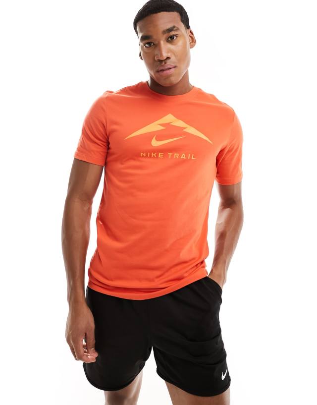 Nike Running Trail Dri-Fit graphic t-shirt in burnt orange | ASOS