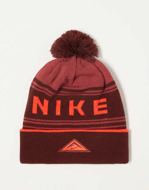 Nike Running Trail Dri FIT unisex bobble beanie in red ASOS