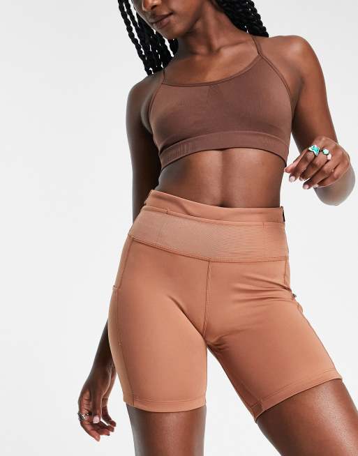 Nike Running Trail epic luxe booty legging shorts in beige ASOS