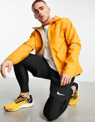 Nike Running Trail GORE-TEX jacket in mustard - ASOS Price Checker