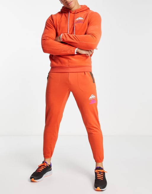 NIKE TRAIL TOUR DU MONT BLANC MEN'S RUNNING PANTS / JOGGERS ORANGE