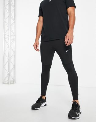 Joggers Nike Running - UV Challenger - Jogger hybride en tissu respirant Dri-FIT - Noir