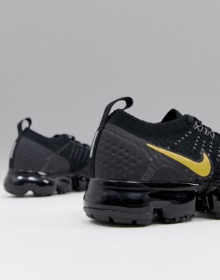 nike running vapormax flyknit trainers in black and gold