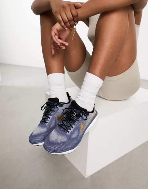 Ladies blue hot sale nike trainers