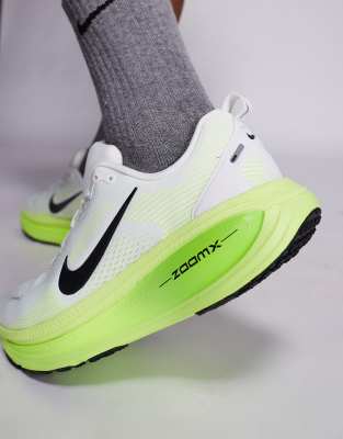 Nike Running Vomero 18 sneakers in white and light green