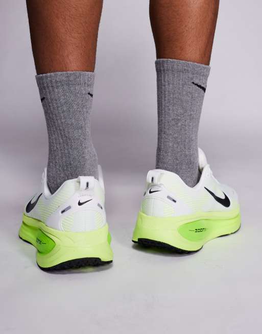 Nike Running Vomero 18 sneakers in white and light green