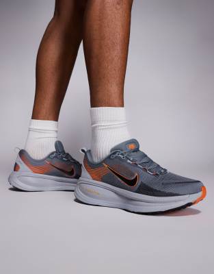 Nike Running Vomero 18 trainers in grey and orange