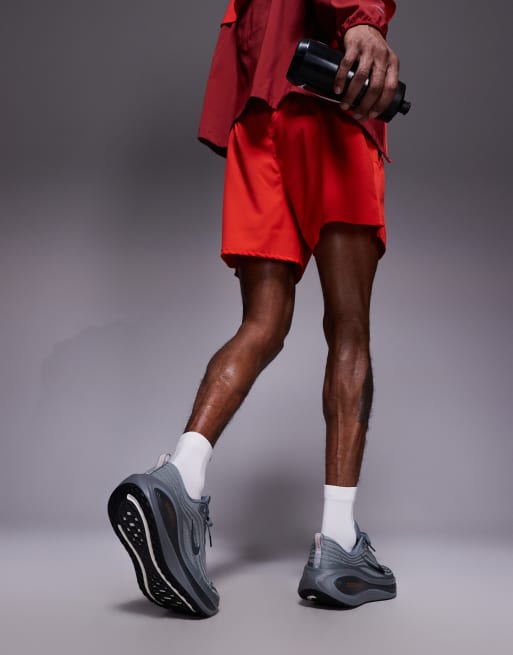 Nike Running - Vomero Plus - Sneakers grigie e arancioni, 5 di 5