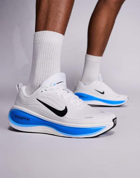 Nike Running Vomero Plus sneakers in white and blue - view 1