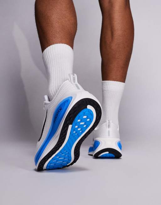 Nike Running Vomero Plus sneakers in white and blue | ASOS