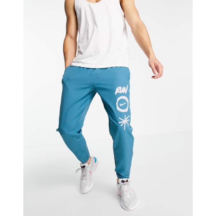 Nike Running Wild Run Challenger Jogger tiss Bleu ASOS