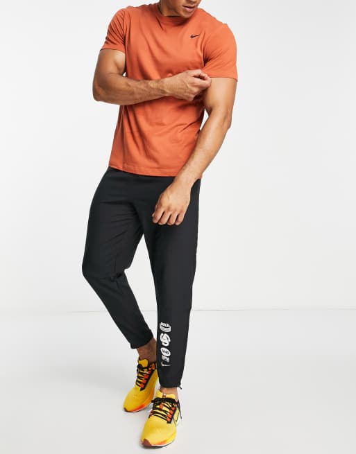 Nike running wild run essential joggers in black hot sale