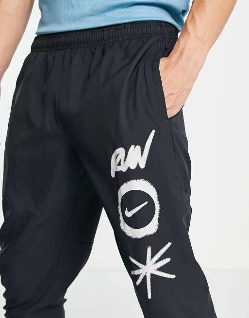 Nike running wild run essential joggers in discount black