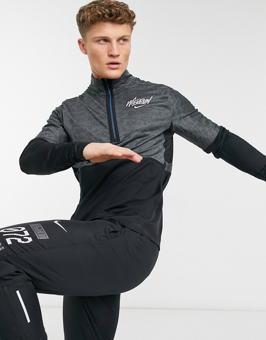 Nike Running Wild Run Element 1/4 zip top in black