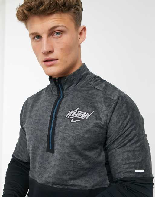 Nike Running Wild Run Element 1 4 zip top in black ASOS