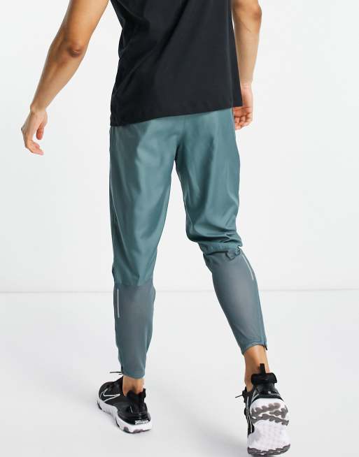 Nike Running Wild Run Essential joggers in grey