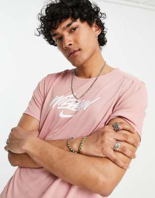 pink and gold nike shirt