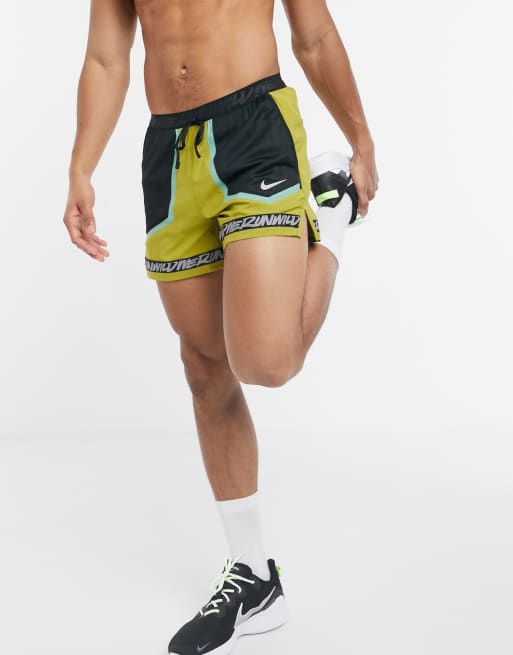 Nike Running Wild Run shorts in green ASOS