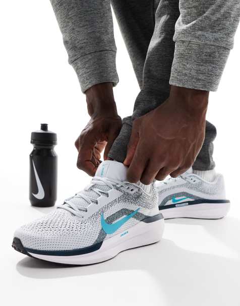 Nike Running Winflo 11 sneakers in white and blue - view 1