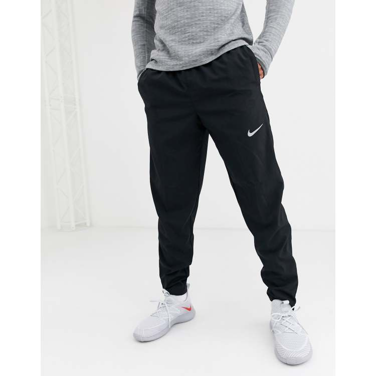 Nike Running woven joggers in black