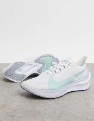 white nike sports trainers