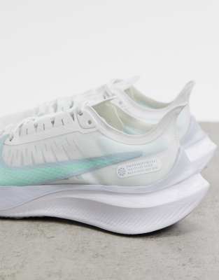 nike running zoom gravity trainers in white