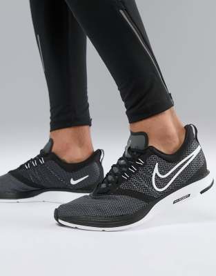 nike running air zoom strike trainers in black