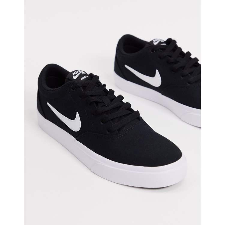 Nike SB Charge Canvas sneakers in zwart wit ASOS