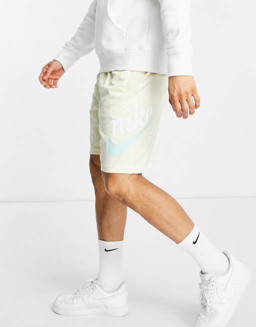 cream nike tech shorts