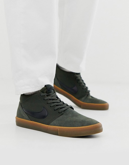 Nike SB Portmore II Solar mid trainer in green with gum sole