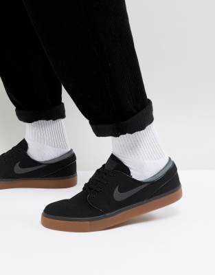 nike sb zoom janoski trainers in black with gum sole