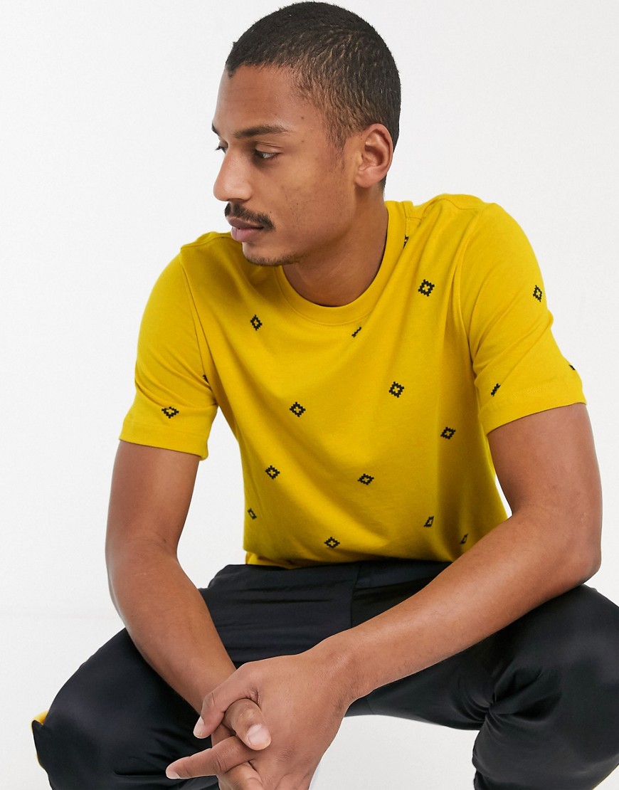 Nike SB - T-shirt met diamantenprint in geel