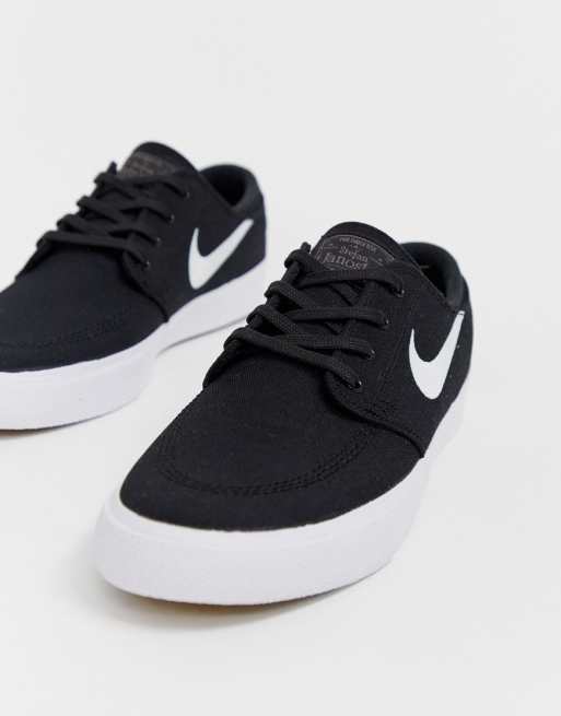 Nike janoski black outlet and white canvas