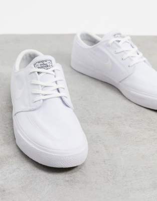 Nike SB Zoom Janoski Premium canvas trainers in triple white ASOS