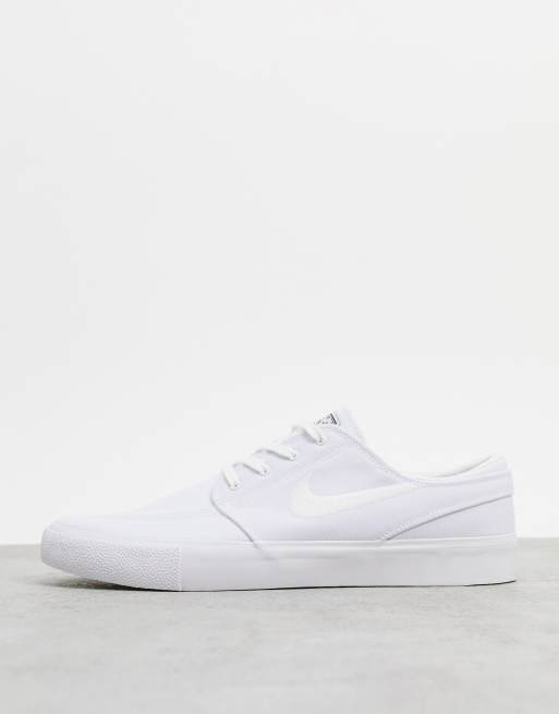 Nike SB Zoom Janoski Premium canvas trainers in triple white ASOS