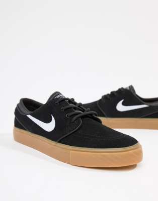 nike sb zoom janoski trainers in black with gum sole