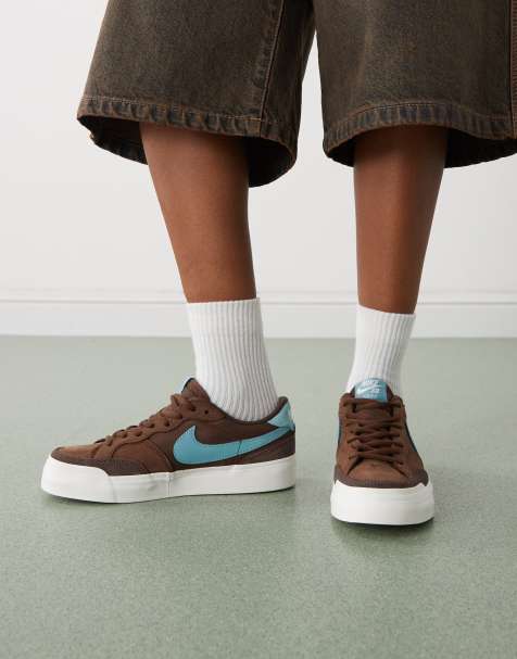 Nike SB Zoom Pogo Plus trainers in brown and blue - view 1