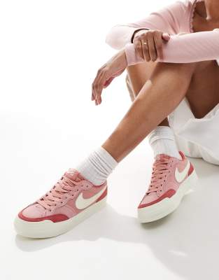 Nike SB Nike SB Zoom Pogo Plus trainers in pink and white