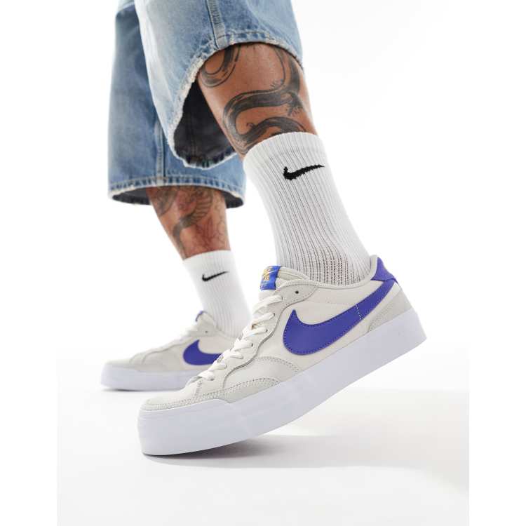 Nike SB Zoom Pogo Plus trainers in white and navy ASOS