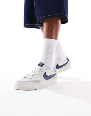  SB Zoom Pogo plus trainers in white and navy 