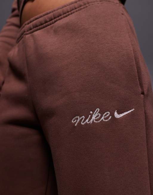 Nike script logo straight leg joggers in brown