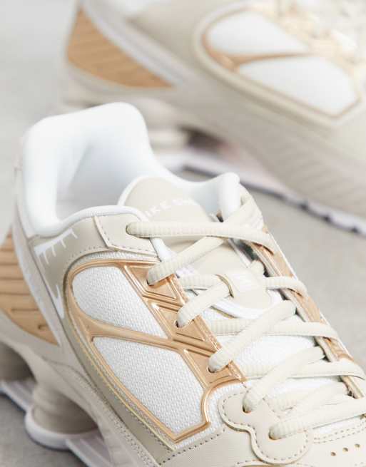 Nike Shox Enigma 9000 trainers in white and sand