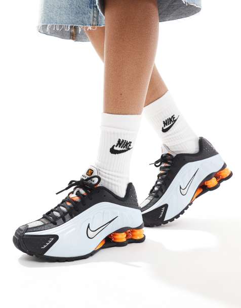 Nike Shox R4 trainers in black and metallic silver - view 1