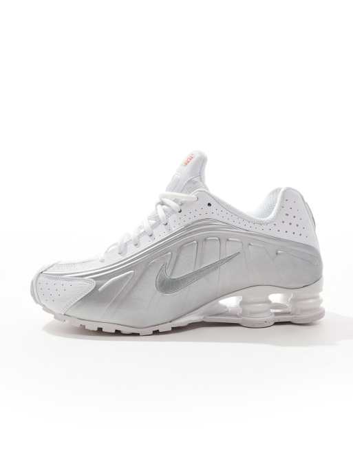 Nike Shox R4 trainers in white and metallic silver