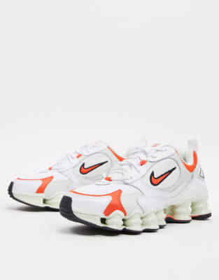 orange and white nike shox