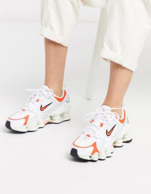 orange and white sneakers